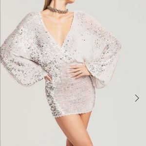 Beautiful sequin mini dress worn on my 50th birthday cruise. So many compliments